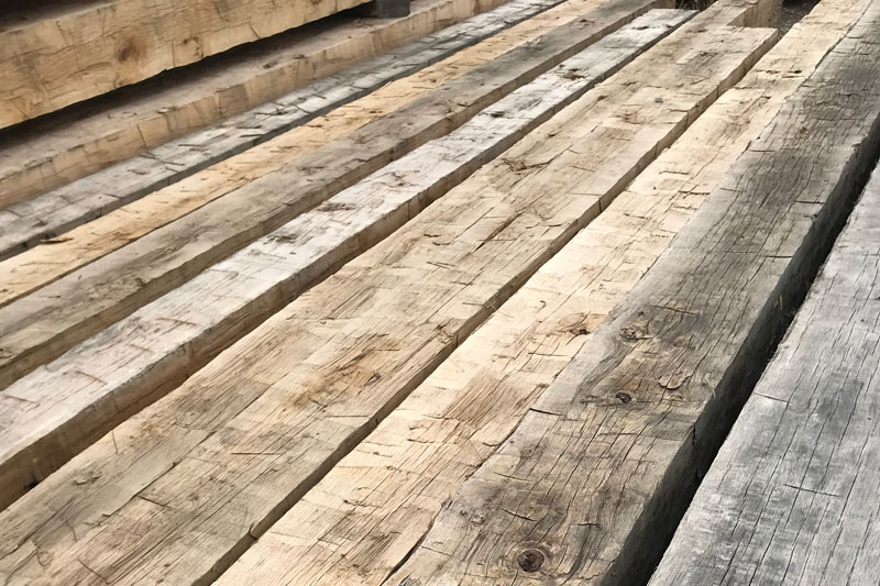 Triple B Enterprises The Reclaimed Timber Company Manufactured Hand Hewn Timbers - Your Source For Repurposed Wall Cladding
