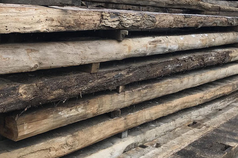 Triple B Enterprises The Reclaimed Timber Company Reclaimed Hand Hewn Two Sided Sleepers - Your Source For Reclaimed Wall Cladding