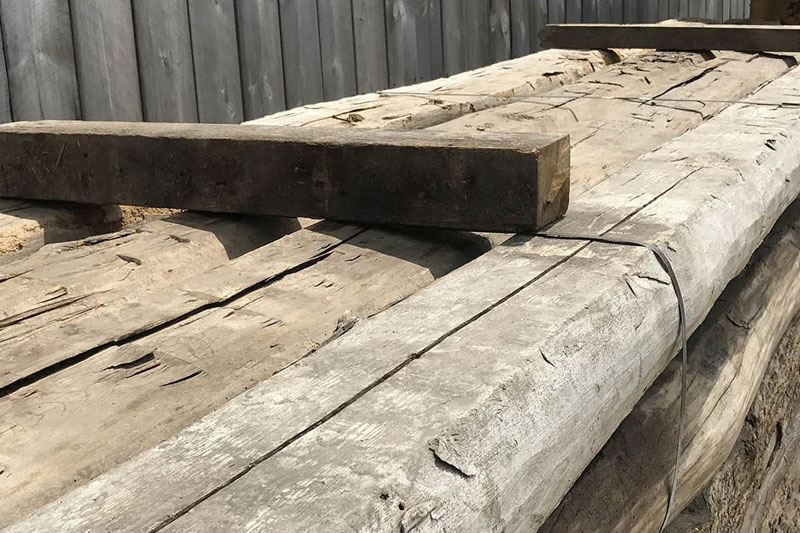 Triple B Enterprises The Reclaimed Timber Company Reclaimed Hand Hewn Two Sided Sleepers - Your Source For Repurposed Wall Cladding