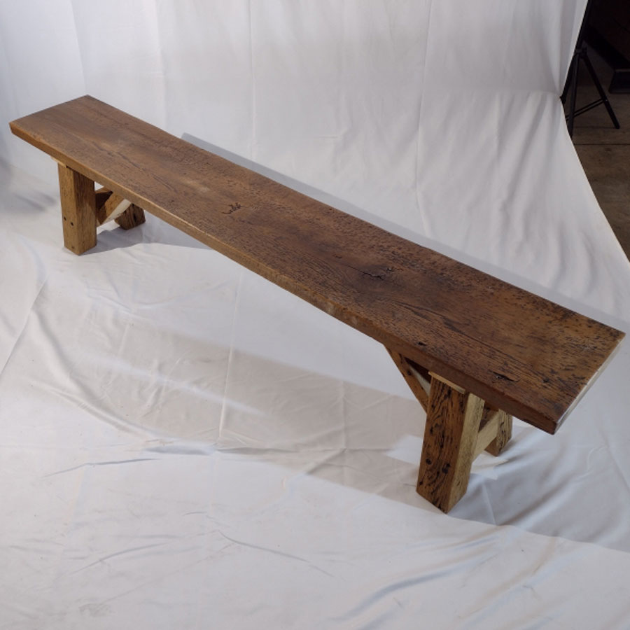 The Barnwood Bench is hand-crafted from lumber salvaged from 100+ year old barns. This reclaimed bench allows for plenty of seating at the table or as a place to seat when entering the foyer.<br /><br />The bench seat is a single reclaimed piece of reclaimed barnwood board. This showcases the quality, durability, and strength of the age-old wood.<br /><br />The bench base is a solid A-frame leg set with a brace to ensure strength for the bench.